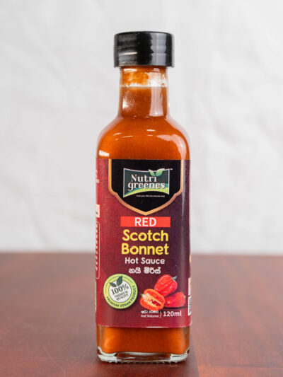 Nutrigreenes Red Scotch Bonnet Hot Sauce 120ml bottle made with fermented Scotch Bonnet peppers